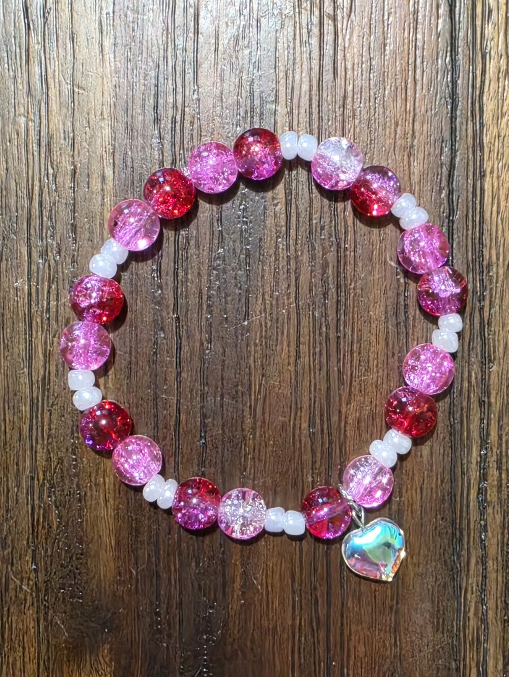 Pink and Red Crackle Glass Bead Stretch Bracelet with Iridescent Heart Charm